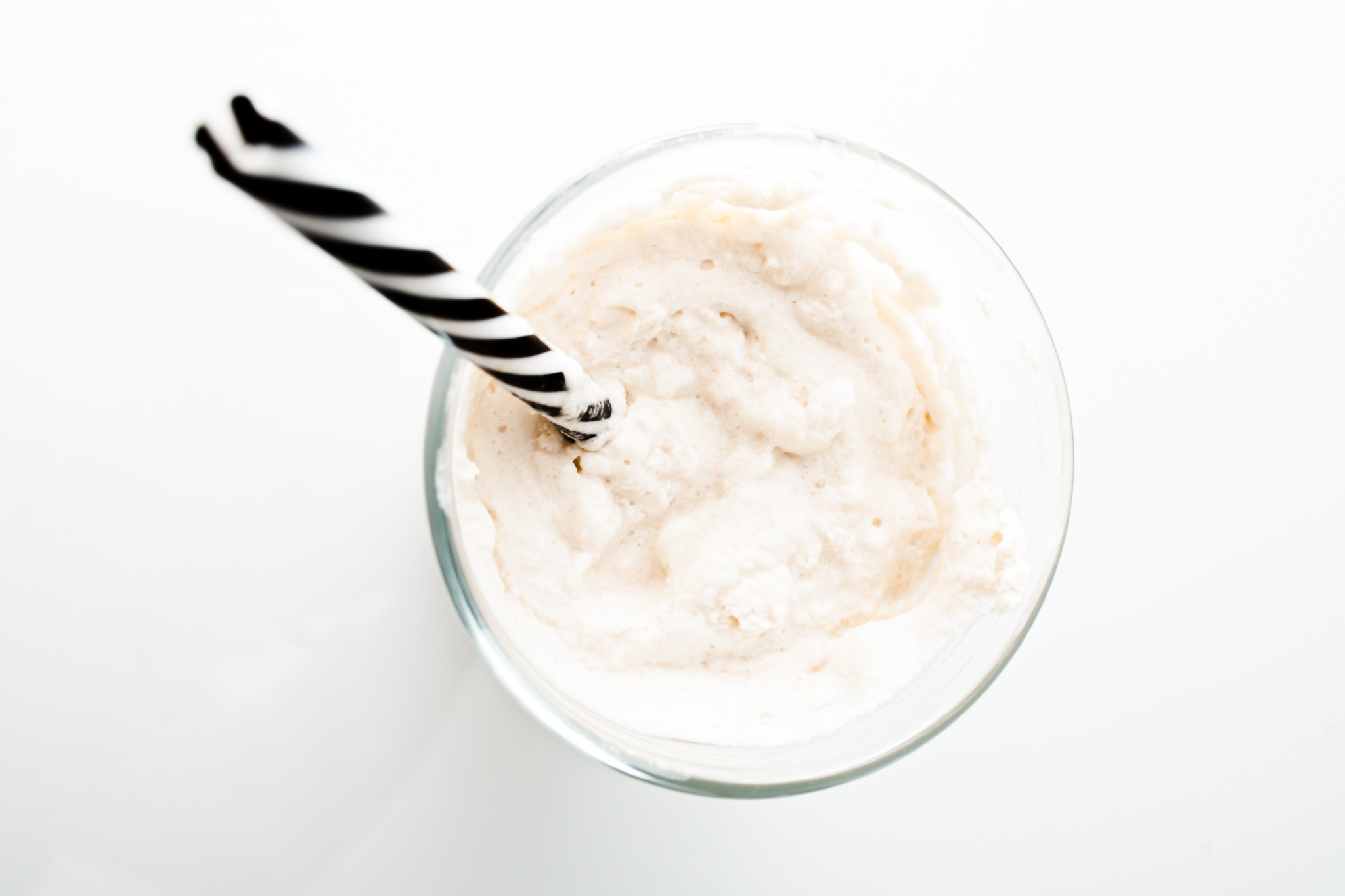 brown sugar whip cold brew with clear glass and black straw