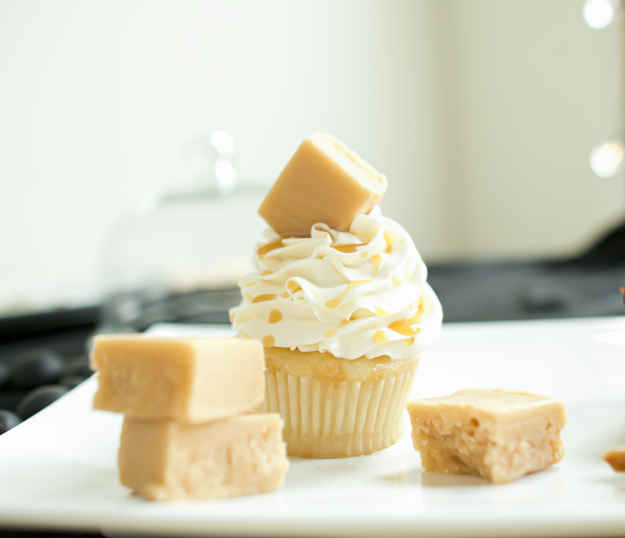 hall's vanilla fudge on top of salted caramel cupcake with caramel drizzle